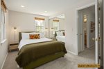 Second bedroom offers a queen sized bed w/ ample space for two -second floor-